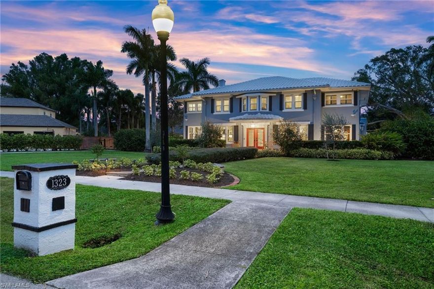 Welcome to the Blue Belle, a unique historic 1930s Fort Myers gem! No other home on the market compares. In one of the most beautiful neighborhoods along the Caloosahatchee River, across the street from the Fort Myers Country Club, and within minutes of downtown Fort Myers, this elegant home sits on a one-acre gated lot. As you enter through the glass front doors, you will immediately appreciate the beautifully restored period details, such as original wood floors and staircase, wood-burning fireplaces, vintage library, and gold-plated Austrian chandeliers. This elegant home was fully remodeled including new impact windows and doors, new baths throughout, new A/C and duct work, and much more. This home boasts five bedrooms, including a two-bedroom children’s suite and playroom, and a private mother-in-law suite with its own outdoor entrance and direct access to the kitchen and pool area. The primary suite has been updated with a luxurious state-of-the-art bath and custom walk-in closet. Perfect for entertainment, the kitchen features high-end appliances, gas range, walk-in pantry, custom cabinetry and granite countertops, overlooking a spacious yard and heated in-ground pool.