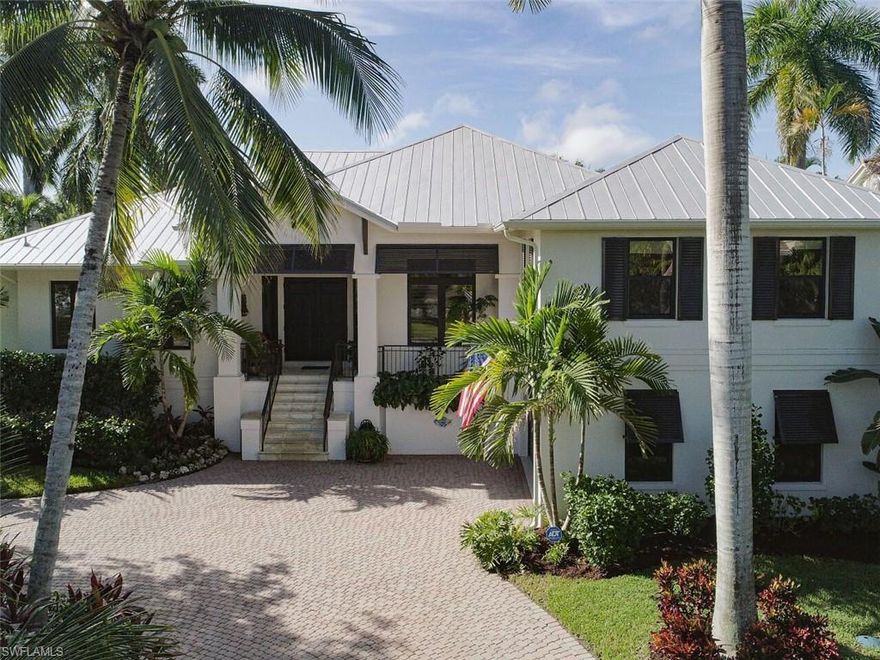 Gulfstream Homes Rebuilt 2017.  Contemporary open floorplan design with Master and Guest Suite on main level.  Desirable southern exposure direct gulf access, waterfront property with new seawall & Azek dock (2017) with freshly wrapped pilings (8/2020).  Two sets of triple pocket sliders invite you to your expansive outdoor oasis highlighted with travertine decking, saltwater pool/spa and lush privacy landscaping.  Luxurious coastal interior features include Legno Bastone wood floors, custom craftsman millwork & cabinetry, and a gourmet kitchen with Thermador appliances and honed Mystery White marble.  Expertly designed with hi-impact low-E glass, icynene insulation, and 3 a/c zones.  Ask me about extensive workshop/storage area +2100'- Must See.  Walk/Bike to beach, 5th Ave S and 3rd St S shopping and dining.