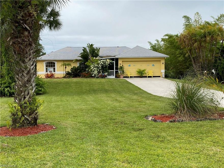 If you work in the City of Naples and must deal with the traffic after work, this home would be a Haven for you to come home to.  There are 1.56 acres of land here in the back that are totally open for whatever you would want.  It's a perfect place for gardening, flowers, animals and a whole different life.  The outside of the house was painted in 2012. The inside of the house has been freshly painted in the last month.  All the French doors in the house have been replaced in the last 8 months. The back porch and front entrance are all tiled in wood-like tile. The air conditioning system I replaced 6 years ago.  The water system is about 8 years old and one tank recently replaced. The bathroom for the two back bedrooms was totally refurbished with tile and is designed for a disabled person.  A new roof was installed in 2018.  There is a wonderful roll in shower with all the safety bars. I have a lot of plants and fruit trees that I have planted here.  I hope you will stop by and see this little piece of heaven.