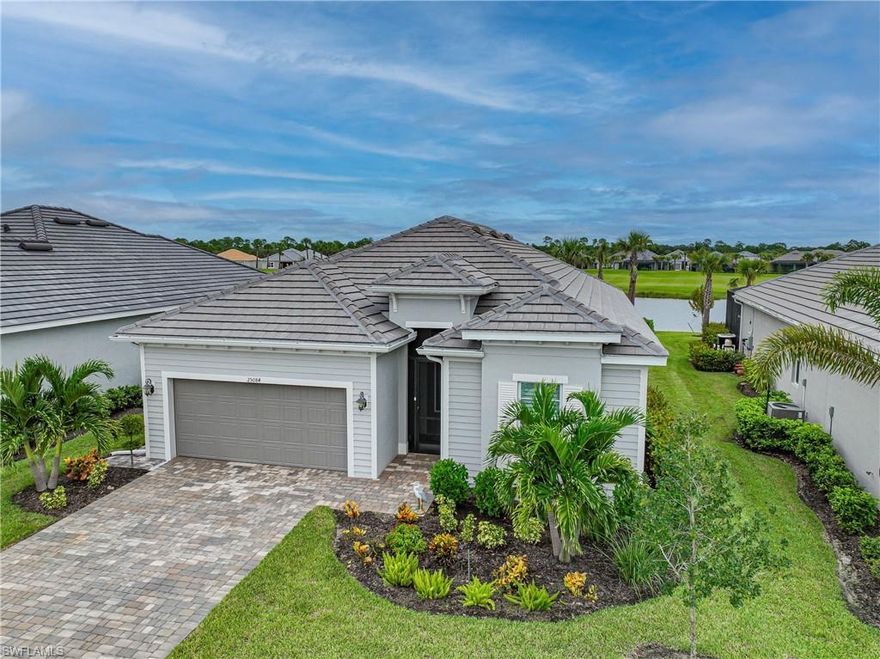 I survived Hurricane Ian! Upgrades galore is what best describes this Maria floor plan home with bundled golf. New Front door with beveled glass. The Office has been reconfigured with Frosted glass French doors instead of pocket doors. Lighted Ceiling fan in every room, Porcelain tile floors throughout and every widow has Plantation Shutters. The kitchen counters upgraded to Quartz, the Sink is now a single bowl with an upgraded garbage disposal, all the Hardware has been changed and the Island has shiplap and has been painted a navy blue. The refrigerator, Washer and Dryer have been upgraded. The secondary baths both have frameless shower doors. The heated pool and spa have been converted to Saltwater with phone automation. Storm Smart hurricane protection for the covered lanai area. This executive home with awesome views also has the advantage of being on a 50-foot manor home lot. There is a whole home and pool equipment surge protection system. So many details you’ll have to see for yourself. The community features golf, tennis, pickleball, bocce ball, a fitness center with spa and three pools to give you a resort lifestyle. Make sure to check out the video.