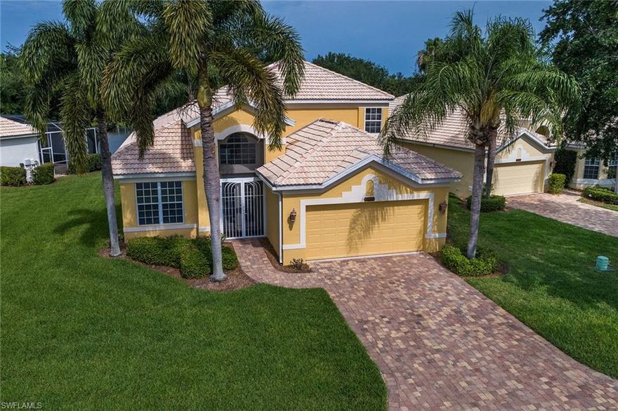 Envision yourself living in this charming single-family home, enjoying its spacious floor plan and private lanai, pool and spa. This 2,089-square-foot home includes three bedrooms, three baths, a den, and a loft. As you enter the residence, you are greeted by high volume ceilings, a spacious floor plan, and beautiful lake views. Pristine tile set on the diagonal runs throughout the house and carpet is fitted in each bedroom. The private lanai can be accessed through the master bedroom, and the master bath includes dual sinks, a separate tub, and a shower. Bright, inviting light blankets all the rooms in this elegant home. The elongated open kitchen features Corian countertops, white wood cabinetry, and a pantry. Choose to dine with your guests in the breakfast bar, breakfast room or separate dining room. The lanai offers a large seating area in the shade, while the pool and spa are bathed in bright Floridian light, boasting a peaceful water feature. Pelican Marsh features a clubhouse with nine Har-Tru tennis courts, a fitness room, and an optional, private Pelican Marsh Golf Club membership. This community is conveniently located near Mercato, Pavilion and Waterside Shops.