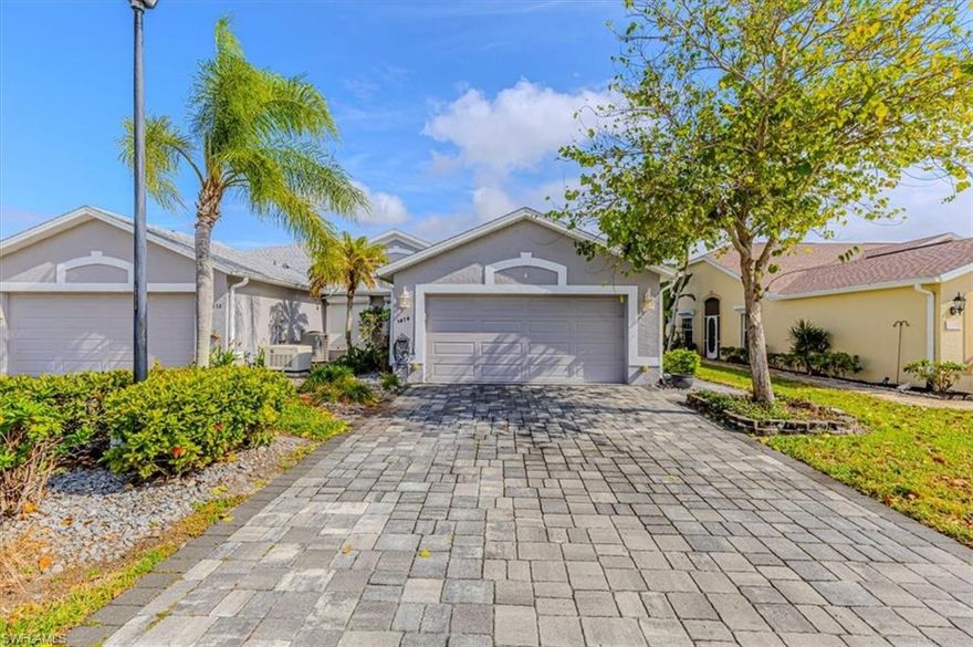 Welcome to your new beautifully upgraded lakefront residence in the heart of Naples that perfectly blends peace of mind, luxury finishes, and effortless Florida living. This meticulously maintained home features a new roof (2017), roll-down storm shutters (2015), and is not located in a flood zone, offering confidence and long-term value. Step inside to discover custom cabinetry, elegant moldings, and crown molding throughout, paired with custom granite countertops that elevate every space. Thoughtful mood lighting and a fabulous new dining room light fixture create an inviting, designer feel ideal for both everyday living and entertaining. Outdoors, enjoy your private heated pool, recently refreshed with a resurfaced pool deck and a new multicolor LED pool light, all enclosed within a picture-frame screened lanai that captures tranquil lake views perfect for morning coffee or sunset relaxation. Prime Naples location close to shopping, dining, and beaches, this home checks every box, upgrades, location, storm readiness, low carrying costs, and scenic views, making it an exceptional opportunity for full-time residents, seasonal owners, or savvy investors. Homes with this level of condition, protection, and value rarely last. Schedule your private showing today.