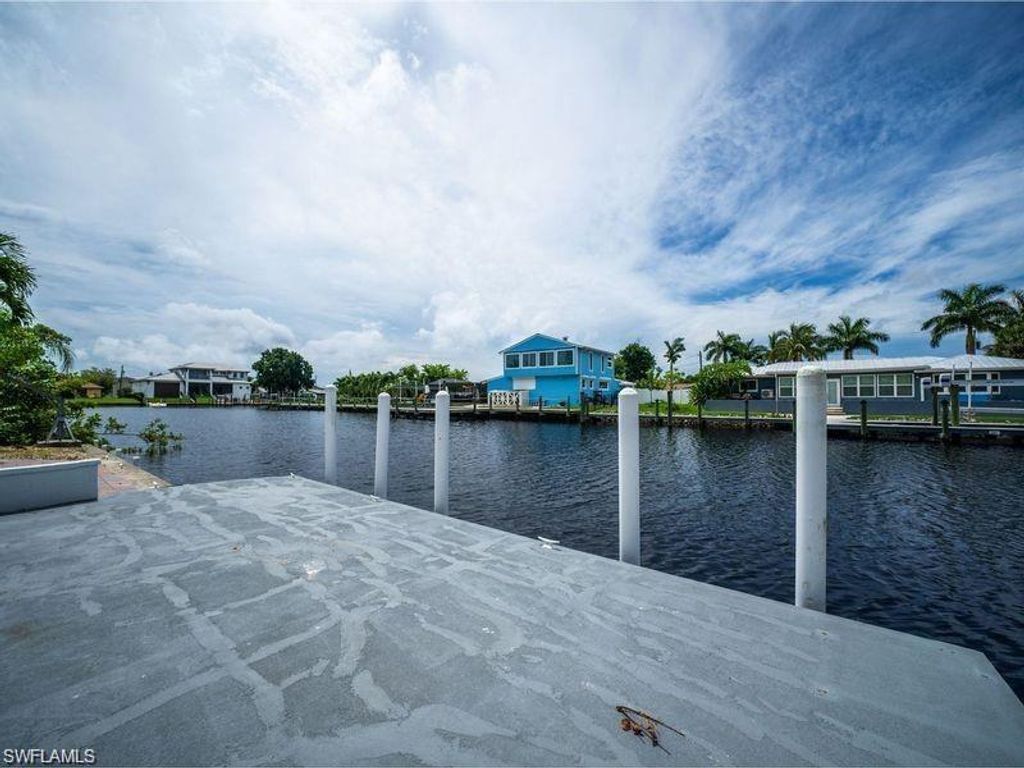 Photo of 2153 Channel WAY W, NORTH FORT MYERS, FL 33917 (MLS # 225083767)