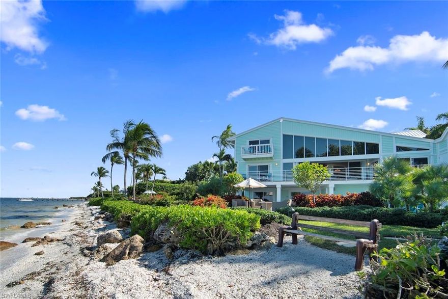 A view you won't forget, in a location you will always remember! Panoramic vistas of the calm San Carlos Bay waters from every room of this spacious 5 bedroom home with 125ft of sandy shell laden shoreline. This residence is perfectly positioned on the lot to maximize the outstanding views. Walls of glass and clerestory transoms allow for maximum natural light and the feeling of being one with the outside. This home is exceptional for entertaining and relaxing inside and out with its palatial kitchen, great room, open airy decks, and fabulous pool/spa area. In addition, there is a workshop, recreation area, three car garage and fabulous storage. An exceptional value in today's marketplace!