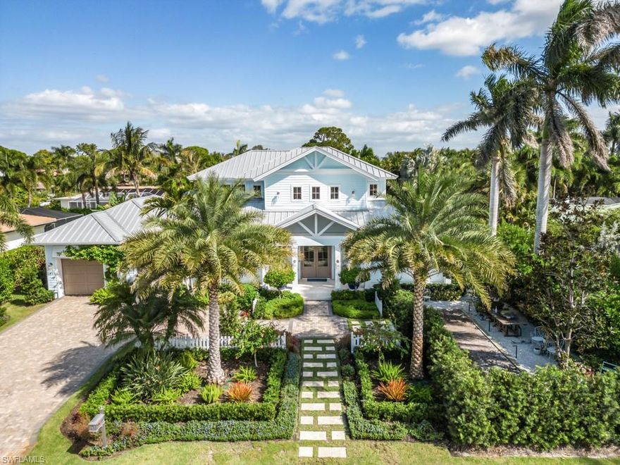 You've JUST GOT TO see it!! Unique and elegant but so comfortable and livable, you'll want to move right in. This Park Shore stunner offers old Florida charm with the benefit of new Florida construction. From the moment you enter the soaring 2 story foyer you'll notice the quality and craftsmanship of the finishes that make this home stand out from all the others. From the thoughtful layout that puts all your needs on the first floor like the main bedroom and office, to the brand new Legno Bastone French white oak, wide-plank floors. Features like a morning bar in the main bedroom and built in bar that includes a beverage cooler and separate ice maker in the living room add to the convenience of living. The landscaped backyard includes a heated saltwater pool, summer kitchen and covered living room that connect to the secluded media/family room so your entertainment space is fluid. In the front yard enjoy a leisurely game of pétanque on the court hidden amongst the lush tropical garden. The three car garage offers boundless space for storage as does the huge air conditioned storage room on the 2nd floor. Everything has been thought of in this beauty!