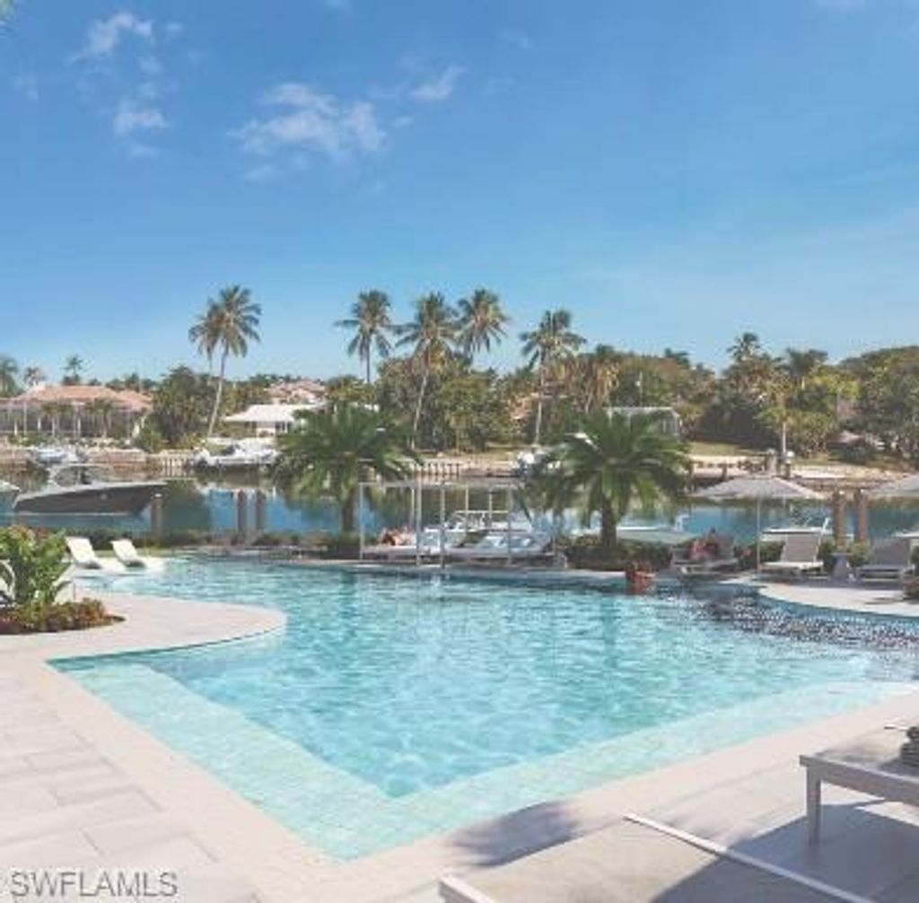 Photo of 2020 GULF SHORE BLVD N #UNIT 203E, NAPLES, FL 34102 (MLS # 226011293)