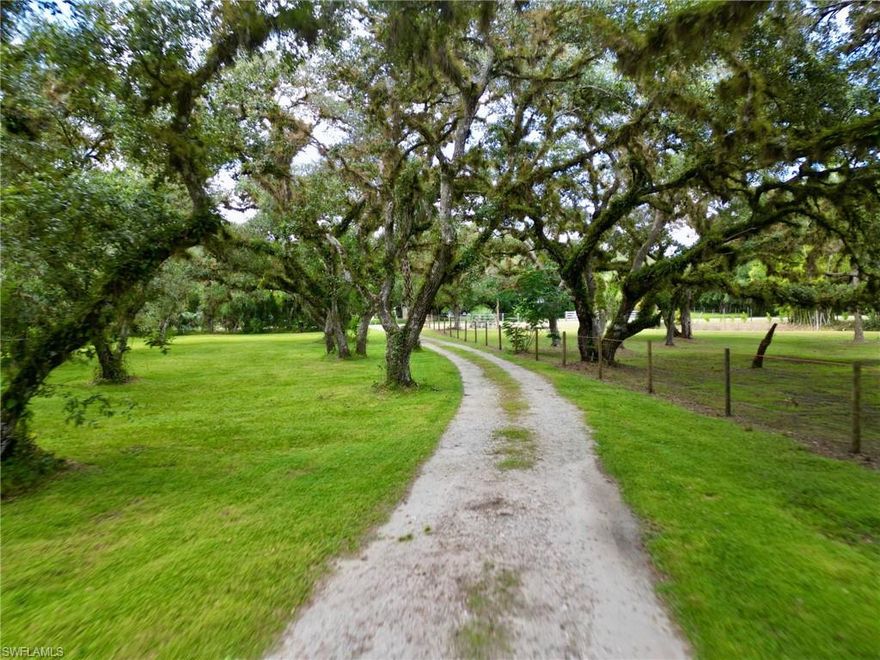 Experience the beauty and serenity of country living on this 4.88 ± acre property surrounded by LaBelle’s signature majestic Live Oaks. This picturesque parcel offers a peaceful setting with timeless appeal and endless possibilities. Enter through an electronic gate and follow the long, beautiful driveway that winds gracefully through the property, creating a warm country welcome. The property features a 1-bedroom, 2-bath mobile home, a charming “she shed”, and an impressive 1,920 sq. ft. enclosed pole barn—perfect for storage, hobbies, or a workshop. Whether you’re looking for a quiet country retreat, a place to build your dream home, or room for your toys and equipment, this property offers the ideal blend of functionality, comfort, and natural beauty.
