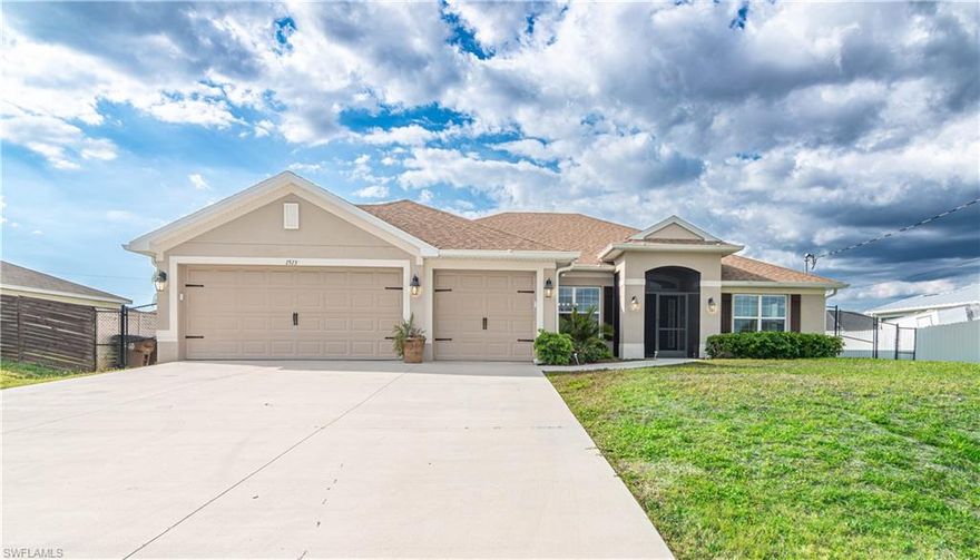 This move-in ready home is nestled in a quiet/family area in NE Cape Coral and showcases a unique, thoughtfully designed layout. Featuring 4 bedrooms plus a den and 3 bathrooms, it offers both space and flexibility for modern living. Soaring ceilings and a designer color palette create a bright, sophisticated atmosphere throughout. Enjoy the extended outdoor patio, perfect for relaxing or entertaining, along with the added benefit of a whole-home RO water system. Meticulously maintained and “like new,” this home is ready to impress from the moment you step inside. Be sure to see the list of the Updates and Features listed with the photos.