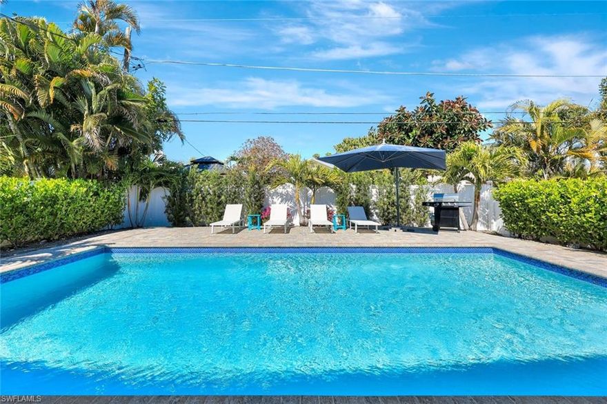 Spectacular completely updated and renovated pool home in sought after Naples Park. Only the finest quality materials, finishes & superior workmanship with attention to every detail were used to create this home like no other currently on the market: Newer roof, high end impact windows and doors, electrical, plumbing, HVAC & epoxy garage floor. Tile flooring throughout the front to back through and through open concept living space with custom designed modern all wood cabinets in the kitchen & bathrooms with dovetail drawers, soft close doors & drawers hardware, a gourmet chef inspired kitchen with oversized counter height island bar & all new kitchen appliances that make this perfect for entertaining guest. The living area spills out to the under roof covered lanai & the new stone paver deck and heated pool that still leaves room for a fenced-in yard for your pets. Meticulously planned landscaping surrounds the home. Take a stroll or bike ride down to Vanderbilt Beach, Wiggins Pass State Park, upscale shopping and dining at Mercato or other nearby entertainment opportunities. NO HOA constraints or leasing limitations, positioning this property as an ideal vacation rental, second home or a full time residence. This retreat in paradise awaits you!