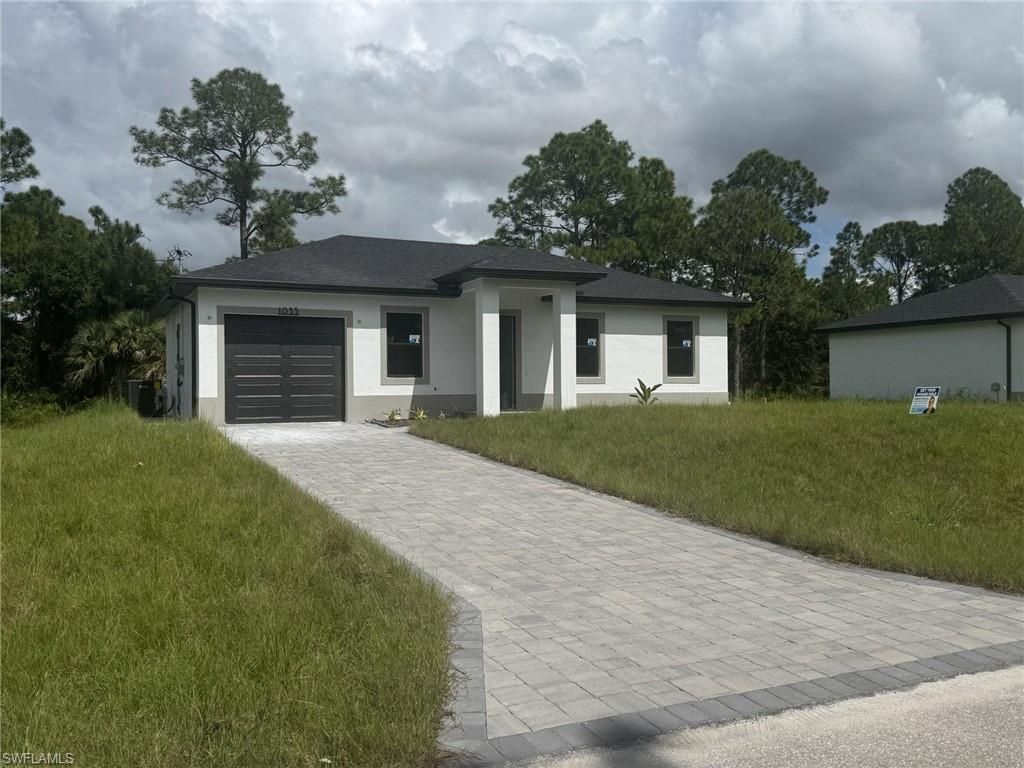 Photo of 1035 Barcelona ST E, LEHIGH ACRES, FL 33974 (MLS # 226005353)