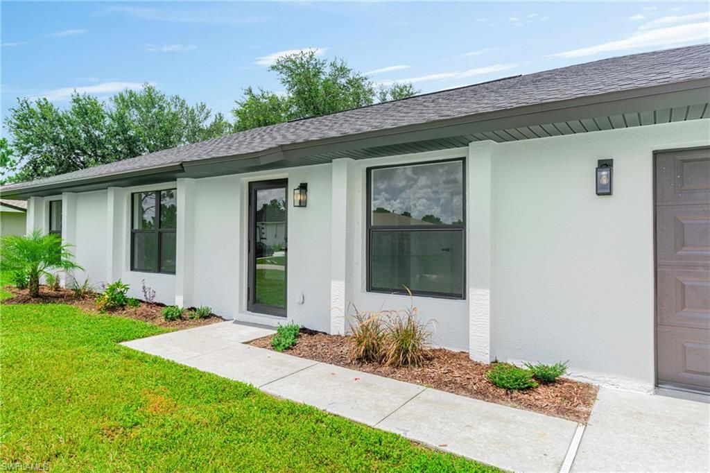 Photo of 3206 12th ST W, LEHIGH ACRES, FL 33971 (MLS # 225082985)