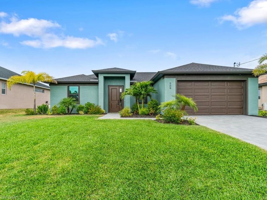 Welcome to your dream waterfront home! This stunning 3-bedroom, 2-bath property, built in 2023, offers a perfect blend of modern elegance and outdoor relaxation. Nestled along a wide freshwater canal with a seawall in place, this home is a paradise for boating enthusiasts and those yearning for waterfront living. Enjoy boating opportunities on the active waterways right from your backyard, or take a dip in the heated pool, complete with a screened enclosure for year-round enjoyment.
Step inside to discover a thoughtfully designed interior with impact windows and doors for added safety and peace of mind. The kitchen is a chef's delight, featuring stainless steel appliances, shaker cabinets, granite countertops, a pantry, and modern lighting. The primary suite offers a touch of luxury with a tray ceiling, dual sinks, a spacious walk-in shower, and a walk-in closet. Located conveniently between Pine Island Rd and Veterans Parkway, this home ensures an easy commute and is just minutes away from excellent schools, shopping, and a variety of restaurants. Whether you're looking for the perfect place explore boating or a serene waterfront retreat, this property checks all the boxes. Don’t miss this opportunity to own a piece of paradise!