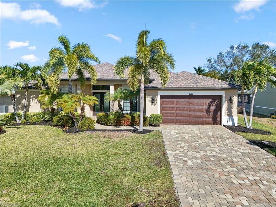 Your Dream Home or a great investment property with a track record. ALL ASSESSMENTS PAID. This central Cape Coral home features high quality materials and style. Travertine floors in major areas, Cherry wood cabinets, stainless steel kitchen appliances including a wine cooler and granite tops throughout. An oversized covered patio and the large heated pool and very spacious deck have ample room for friends and family gatherings all within a privacy fence. Spacious bedrooms, trey ceilings and a Den/study with double-doors that is perfect for a game room or a 4th bedroom. Paver driveway and full pavers around the pool and deck are complimentary colors of the home exterior and lush tropical landscaping in the front. Pet friendly back and side yard with the vinyl privacy fencing.