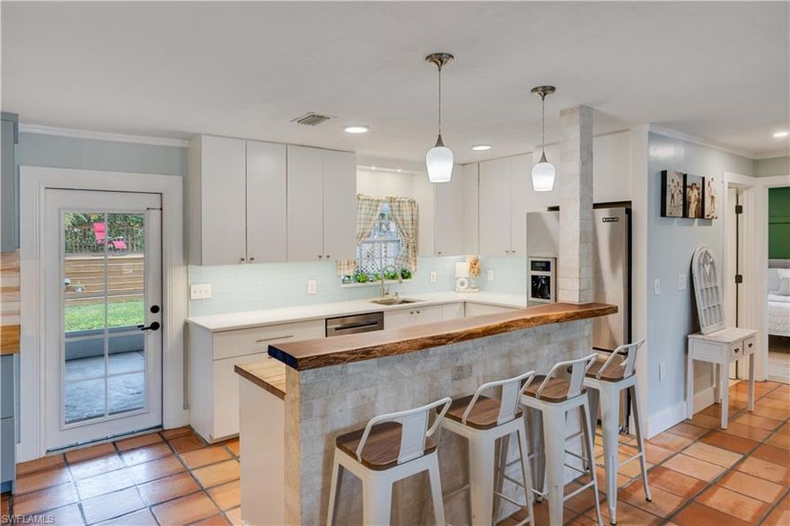 This beautifully unique 3-bedroom, 2-bath single-family retreat in desirable Northeast Cape is anything but cookie-cutter. Thoughtfully designed and meticulously maintained, this home blends comfort, character, and peace of mind-perfect for a family ready to enjoy the Southwest Florida lifestyle. The kitchen is a true hub of the home, ideal for cooking, entertaining, and organizing your week. It features solid surface countertops, stainless steel appliances, a dedicated coffee bar, and tall upper cabinets that offer both style and generous storage. Enjoy modern efficiency with a brand-new Rheem tankless water heater, a SpringWell whole-home water filtration system, and an additional BHYVE irrigation system within the home. The property is also equipped with an LCEC whole-home generator plug, ensuring you’re prepared year-round. A Samsung washer and dryer set is included, along with a Best Home Services comprehensive plan, meaning the entire home will be serviced, current, and truly move-in ready.
Adding to its versatility, the garage has been converted into a flexible bonus room, perfect for a home office, study, or potential family room, and can easily be converted back into a garage if the buyer desires.
Need extra storage? The property features a large shed with electricity and a loft, perfect for toys, tools, or man-cave hobbies. Safety and convenience are top priorities with hurricane impact windows and shutters, a keyless entry system, and the added peace of mind of a newer roof and non-flood zone location.
One of the home’s most unique highlights is the built-in fish tank, adding a serene, coastal touch to your dining experience and making every meal feel like you’re dining beneath the waves.
Step outside and enjoy a backyard featuring a variety of fruit trees already planted and ready to grow, creating your own slice of Southwest Florida living.
This is more than just a home, it’s your personal oasis in Southwest Florida. Schedule your showing today!