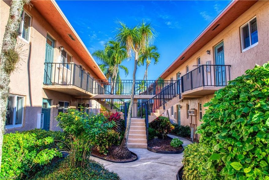 E-Z-2-C!! You’ll want to see this second floor end unit with 200SF screened balcony first! Updated kitchen, impact windows and sliders - ready for quick occupancy! The club offers bundled golf membership with two recently renovated courses - The Pines (Par 70) & the Palmetto (Par 55) Executive course - get unlimited golf & NO GREENS FEES. Golf privileges transfer to renters. Resort style living with newly remodeled clubhouse, 10 championship tennis courts, 9 pools with yoga & water aerobics classes, 4 Bocce ball courts, shuffleboard, 19th Hole private restaurant for dining with no food & beverage minimum, Pro Shop, shuffleboard & seasonal activities. Walking distance to shopping, movie theater, museum & restaurants. Truly a friendly community all within 10 minutes from the world-renowned white sugary beach on the Gulf of Mexico with epic sunsets. Enjoy world-class shopping, dining and fun nightlife in Olde Naples. Plenty of activities for everyone! Move in now for your own winter paradise or invest for income - it’s easy & affordable living at it’s finest! Call now! ASK ABOUT FINANCING--IT CAN BE DONE!!!