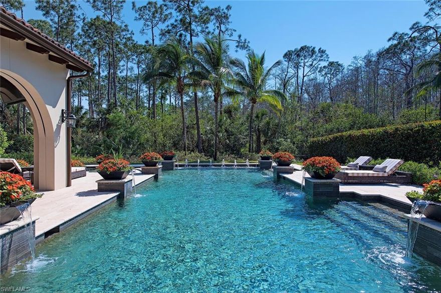 Located in the highly sought after neighborhood of Cortile in the heart of Mediterra. Beautifully updated with one of the best oversized resort style pools in the entire community. Ideally positioned on a light and bright southern exposure home site. Recent updates include Cristallo quartzite countertops, contemporary backsplash tile, Legno Bastone hardwood floors, and an incredible custom floor to ceiling quartz TV wall with shelves and fireplace. The Girona model is the most popular floor plan built in the Cortile villas with its open great room plan with generous outdoor covered area and a 3 car garage.