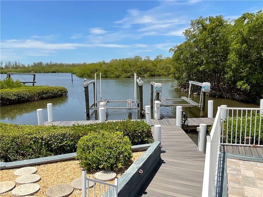 Exceptional opportunity to own a waterfront vacant lot in a desirable 55+ community in Bonita Springs, just minutes from Coconut Point Mall. fine dinin, golf and the RSW Airport, perfectly positioned between Naples and Fort Myers. Build your dream home in a peaceful, well-maintained neighborhood designed for active adult living. The amenities community has something for everyone: clubhouse, pool, tennis, pickle ball, bocce, basketball, billiards and activity center.