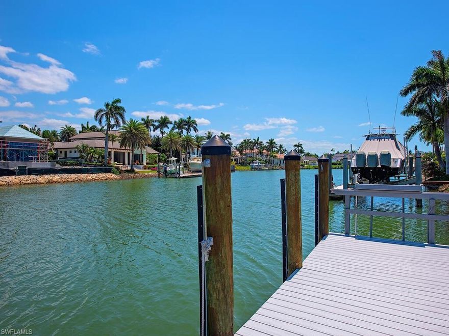 Lowest priced waterfront with Gulf access in Port Royal. A Classic, Old Port Royal property. Located on quiet water, with direct, easy access to the Gulf of Mexico. Build your new Custom home or live in the house while you design your dream home! This property has immediate Port Royal Club membership available. Get ready to enjoy the spectacular new $100M clubhouse slated to be completed late 2026. Dining at beach and pool level. Dazzling Gulf views from the main level restaurant with several bar areas, providing indoor/outdoor seating options, and a beachfront pool area with cabanas. Enjoy the Naples lifestyle, minutes from Downtown Naples, with its fine dining and shopping!