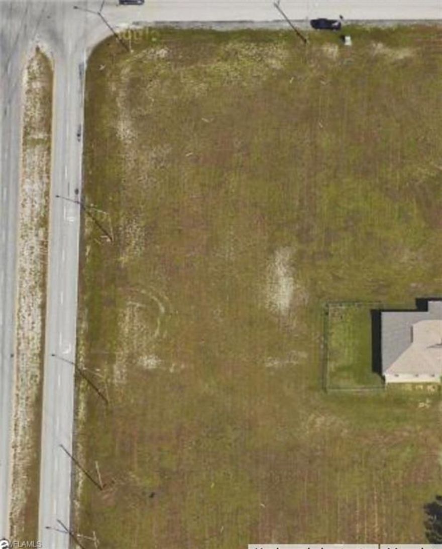 Commercial property available in Cape Coral. It's in a non-flood zone, and the adjacent property is also for sale.