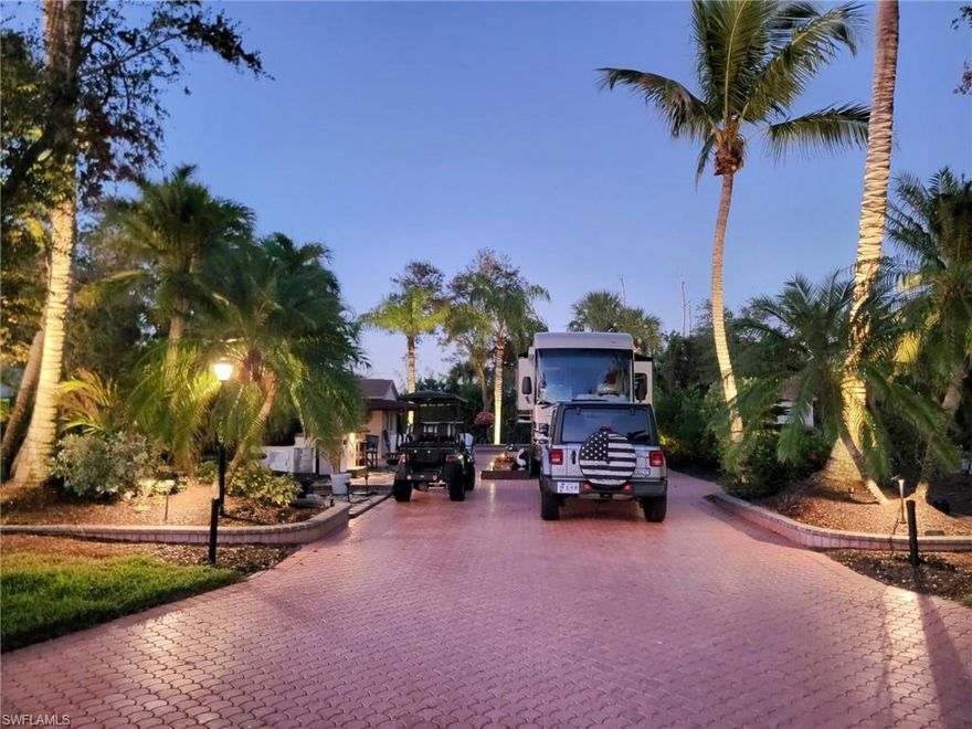 Luxury Class A Motorcoach site located in Pelican Lake Motorcoach Resort This site spans approximately 5227 square feet with an upgraded paver pad and raised extended patio.  Back-in to this private site that is meticulously maintained with newly installed landscaping, landscape lighting and new electric pedestal in 2023.  This property also includes a 10x10 coachhouse on the northwest corner that was renovated in 2023 with new flooring and cabinets, AC, full size Samsung washer & dryer, sink, toilet, and shower. Move in ready motorcoach Site!