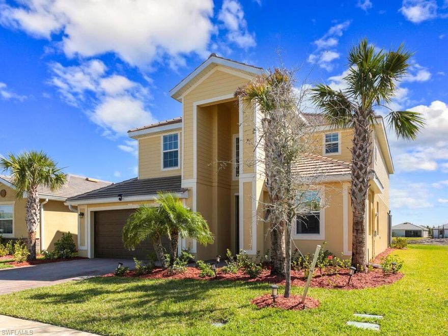 Meet the Monte Carlo home floor plan - a spacious and inviting residence spanning over 3,200 square feet with 5 bedrooms and 3 baths. This home has plenty of room for everyone, from the formal living and dining areas on the first floor to the open kitchen with island that seamlessly connects to the family room, creating a comfortable and relaxed atmosphere for entertaining guests. Plus, a large bedroom with a full bath is conveniently located on the first floor, making it perfect for guests staying over. Upstairs, the owner's suite boasts two walk-in closets and a generously sized bathroom. There's also a loft and extra bonus room that provide additional space, perfect for a play or media room. Step outside and enjoy the covered lanai with pool and spa, perfect for relaxation. The home also offers a 3-car tandem garage. Located in Hampton Lakes, a part of the master-planned community of River Hall, residents can take advantage of access to distinct villages, a school, fire station, Town Hall, and a Town Square. Hampton Lakes is conveniently situated just six miles east of I-75, making it easy to explore the rest of area.