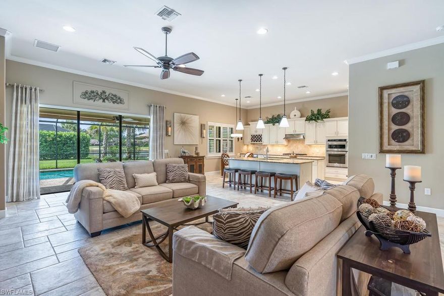 THREE is a magical number; 3 bedrooms, 3 bathrooms & a coveted 3 car garage are just the beginning of what makes your new home magical! Step inside the stained glass front door to your stunning Cameron model built in late 2015. You'll love entertaining in this expansive open floor plan seamlessly flowing from dining area, to family room, kitchen & even out to the screened lanai through disappearing sliders where you'll love your natural gas heated, salt-water pool & spa. Each bedrooms has its own full bath so family & guests will have their own space & the tankless water heater ensures enough hot water for all. Your chef's kitchen has top-of-the-line Kitchen Aid appliances, natural gas cooking, wall oven & wine cooler. Double-islands topped with upgraded granite, white cabinetry & a large pantry give you more storage space than you'll ever need. Upgraded tile & wood floors throughout the home as well as plantation shutters on all the windows. Camden Lakes is an intimate, socially active community located West of 75 on Livingston Rd with easy convenience to North/South travel & just 20 minutes to the airport. Low HOA fees include all landscaping, irrigation, & amenities.