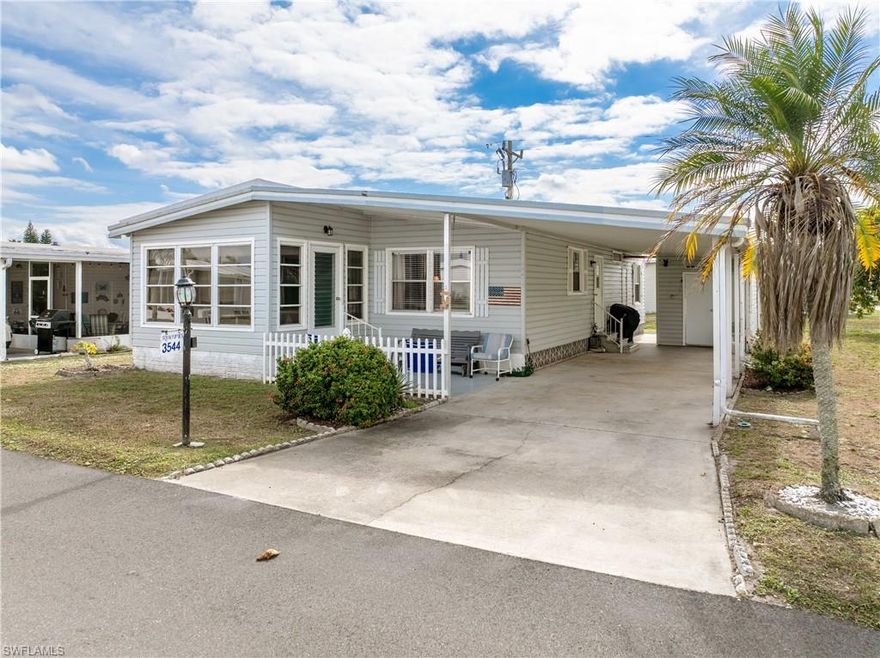 Welcome to this beautifully maintained home in the highly sought-after 55+ Tamiami Village community! Enjoy true peace of mind with a new aluminum roof-over (2023) and a brand-new A/C system with all new ductwork installed in January 2026—major upgrades already completed.

Inside, the home is spotless, bright, and truly move-in ready, featuring flooring that’s approximately 3 years old and most appliances replaced within the last few years, adding modern convenience and reliability. The layout is ideal for seasonal or full-time Florida living.

Step into the active, social lifestyle Tamiami Village is known for, offering three community pools and a full calendar of activities. This home includes the park share certificate valued at $11,500, keeping your monthly maintenance fee at just $213.77, an exceptional value for this community.

Ideally located near downtown dining, shopping, nightlife, and popular local events, with a short drive to Fishermen’s Village for waterfront restaurants, live music, and boutique shopping.

Just bring your toothbrush and start enjoying the Florida sunshine lifestyle!