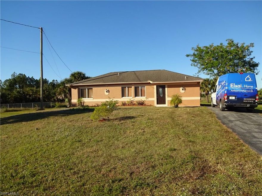 Enjoy quiet country living in this 3 Bedroom 2 Bath home. Situated on partially fenced 2.28 acres in Golden Gate Estates. This cozy home also features stainless steel appliances, tile floor, 7''1/4 base board, and crown molding. The professional installed surround sound system will stay with the house. Spacious back yard with enough room for a pool. No HOA fees!!!!NO restrictions!!! Perfect home for first time home buyer,growing family or Investor. Don't miss this opportunity!!!