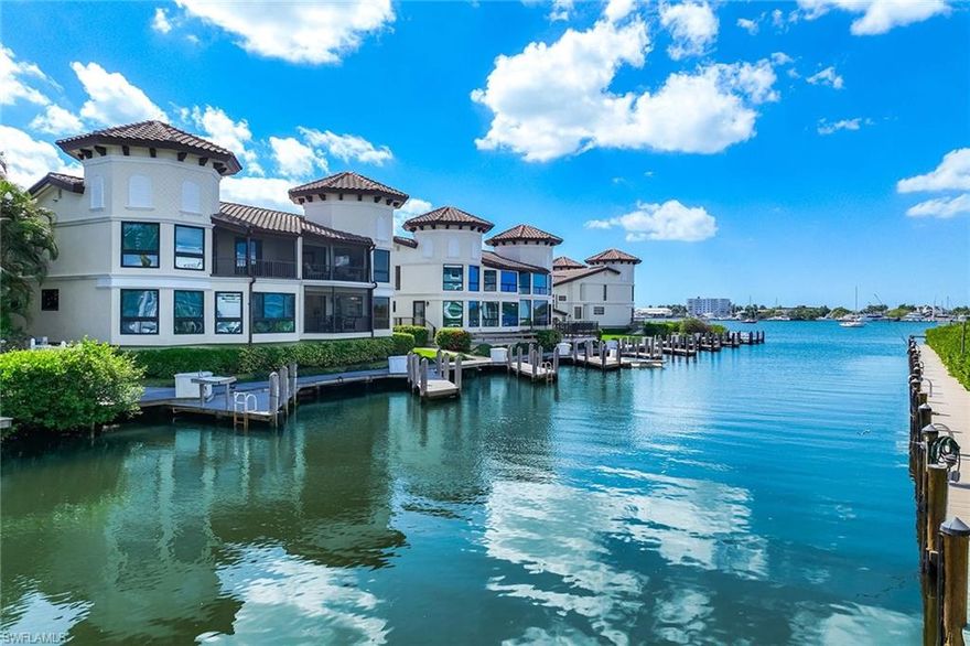 This beautifully renovated Naples Bay view townhome is tucked at the end of a cul-de-sac in the sought-after Royal Harbor area, where a private boatslip just beyond the patio accommodates up to a 32-foot vessel and offers quick access to open water. Set within an intimate enclave of just eight residences, the property captures the essence of relaxed waterfront living, complete with captivating bay views and an air-conditioned oversized two-car garage with epoxy flooring.

The home offers a refined yet effortless coastal lifestyle, with a community pool, two private patios on different levels, and water views that invite you to watch yachts cruise by and dolphins play in the bay. Inside, more than $315,000 in upscale renovations elevate the interiors with large rectified porcelain tile throughout, an expanded kitchen with creamy onyx countertops, walk-in pantry, custom built-ins, and premium glass and stainless appliances, including a Miele dishwasher and built-in wall ovens. The great room opens to a screened waterfront patio, while the dining room and wet bar with wine cooler and custom cabinetry create an ideal setting for stylish entertaining.

With three spacious bedrooms, elegantly updated baths, direct boating access and a location just minutes from Old Naples dining, boutique shopping and Gulf beaches, this residence is the complete package for luxury waterfront living.