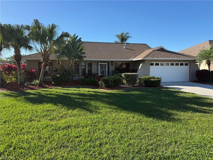 This 3 bedroom, 2 bathroom swimming pool home is located in the heart of Cape Coral on a freshwater canal. The property is within close proximity to public schools, dining, grocery stores and entertainment. The property features an open floor plan. When entering the home one has unobstructed views of the swimming pool as well as the freshwater canal that is located behind the home. The vaulted ceilings make the main living room, dining room and kitchen feel very large. All main living room sliding glass doors to the lanai pocket, which is perfect during the winter time as the entire span can be opened. 
The primary bedroom with access to the lanai through a sliding glass door features an en-suite bathroom. The bathroom has dual sinks, a shower as well as a separate toilet. The guest bedrooms are located on the opposite side of the home and share a bathroom. The outdoor lanai is screened in, features a spacious electrically heated swimming pool as well as a pool cage that features panoramic windows for unobstructed views. A few of the recent upgrades include a new AC in 2025, the pool cage was replaced in 2023, the roof was replaced in 2020 and the fence was replaced in 2025, newer swimming pool pump/motor, the kitchen appliances were replaced in 2022.