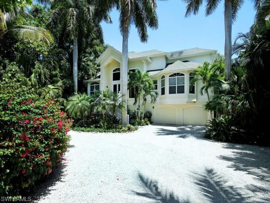 Your own private paradise "Captiva Charm" awaits you at the end of a 500' private driveway running through lushly vegetated grounds. Gorgeous direct bayfront estate home overlooks Roosevelt Channel, with boating & fishing from your own private dock with 10,000lb boat lift. Relax outdoors; wooded & private with large fenced area for garden parties, open pool & porches overlooking the bay. Beautifully appointed elevated home features 4 of the bedroom ensuite, a second kitchen & den, granite, stainless & wood kitchens, soaring two-story living room with gas fireplace & so much more! Includes beach access.