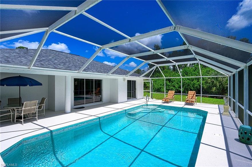 Fully Renovated Pool Home On Huge Private Lot! Rarely available secluded home with all sides surrounded by lush wooded undeveloped land. Fully remodeled from floor to ceiling, inside and out, is like-new, even down to the refinished pool. The most appealing feature is the one of a kind private, secluded, quiet double lot. Located at the end of a dead end, little no no traffic low-density area of the neighborhood, this lot boasts 100% privacy in the rear of the property. Nothing but lush green natural privatizing greenery surrounds the home, pool and large rear and side lots. Perfect for children to play and furry friends. Ample outdoor storage for trailers, boat or RV. All in a quiet setting with nothing but the sound of birds chirping and rustling trees. This is a true Florida tropical oasis. When entering the home, you are met with long plank wood-look floors framing a bright and airy floor plan with views directly out to the pool. The kitchen showcases new white shaker cabinetry and light colored granite countertops. The bathrooms follow suit with transitional design vanities with walk in tile fully glassed showers. Nickle-gap custom carpentry accents multiple walls combining a Traditional design with a more modern Coastal Casual appeal. Entire home was recently repiped with all new plumbing, not as a claim, but as a precautionary measure. Combined with new fixtures, new kitchen, baths, washer, dryer, water system - this is a like new appointed home. The living room flows out through large bypassing sliders to a huge screened in lanai with a dining area under covered truss and also open lounging areas on the pool deck. Pool was just refinished with new glass tile to bring it back to like-new condition. Peace of mind and insurance savings also value added from new roof. One car, deep garage provides ample storage. The back and gigantic double-lot side yards provide endless possibilities. Everything inspected and every detail attended to, this home is immaculate with great care and attention to every detail for the most discerning buyer. Located in a quiet enclave, yet conveniently close to local Jack's market, local restaurants, grocery, pharmacy, parks and more. Short trip to airport and all southwest Florida living has to offer.