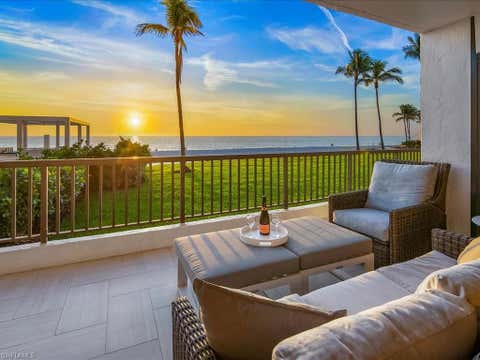 Photo of 2386 Gulf Shore BLVD N #104, NAPLES, FL 34103 (MLS # 225079441)