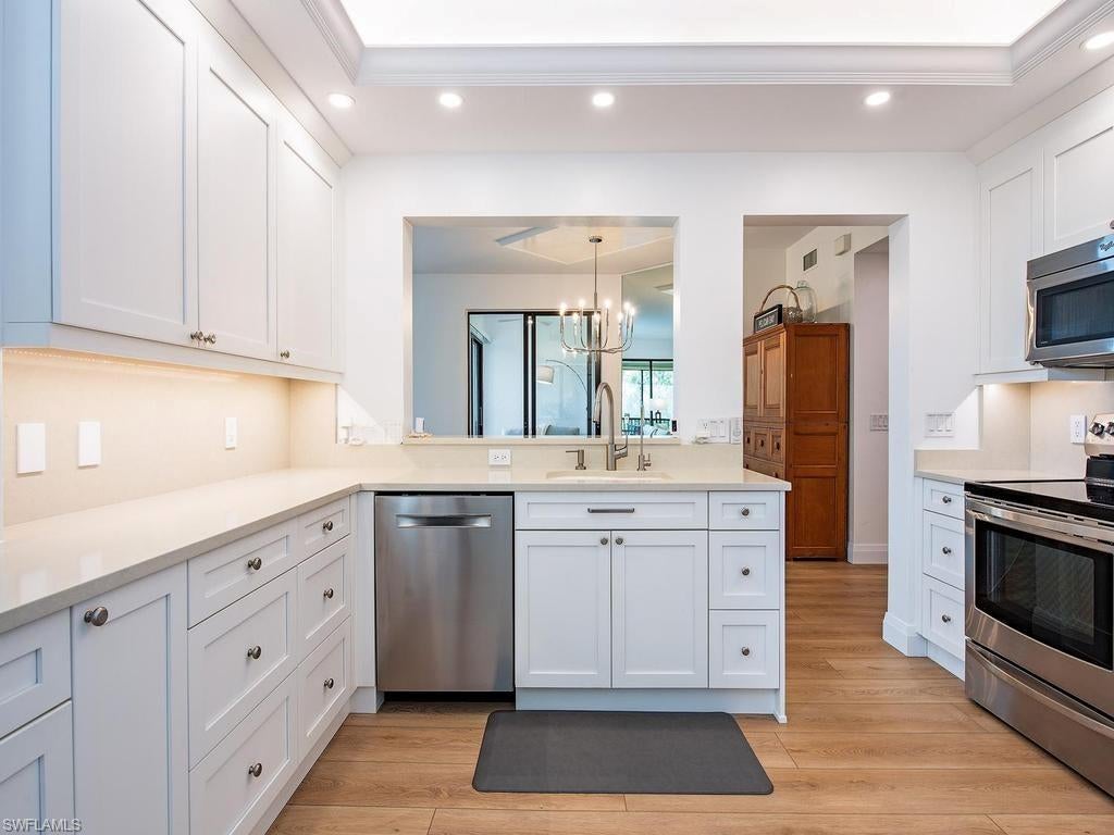 7040 Pelican Bay BLVD D302
