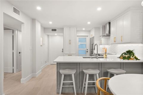 Photo of 1300 Gulf Shore BLVD N #109, NAPLES, FL 34102 (MLS # 225063710)