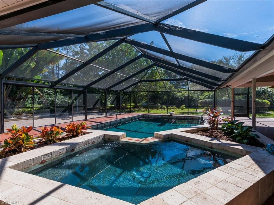 MOTIVATED SELLER, NEARLY 2 ACRES. Sprawling ranch home, located on one of the nicest streets in Briarcliff. 3,000+/- sq ft under air, with 3 bedrooms, plus office/den, 3.5 bathrooms, pool, and attached garage. The additional 1400 square foot air-conditioned detached workshop/garage/recreation area is an unbeatable bonus and can easily fit 4 cars inside and 4 cars on the side carports; a perfect home for cars, large boats, and RVs, or perhaps a potential guest house! The Gourmet Kitchen invites you in with beautiful granite countertops, oversized island, raised panel cabinets, wine refrigerator, eating area, warming tray and high-end stainless steel appliances. French Doors in large master suite open up to the private screened lanai. .9ster Bath includes free standing tub, 2-person frameless shower, his and hers separate vanities & large walk-in California closet. The Oversized screened lanai with tropical pool/spa, pool bath with shower, and summer kitchen will exceed all of your entertainment needs. Other enhanced features include wood burning fireplace, koi pond, extensive landscaping, skylights, fresh exterior paint, and new a/c in 2016. Central Water available.