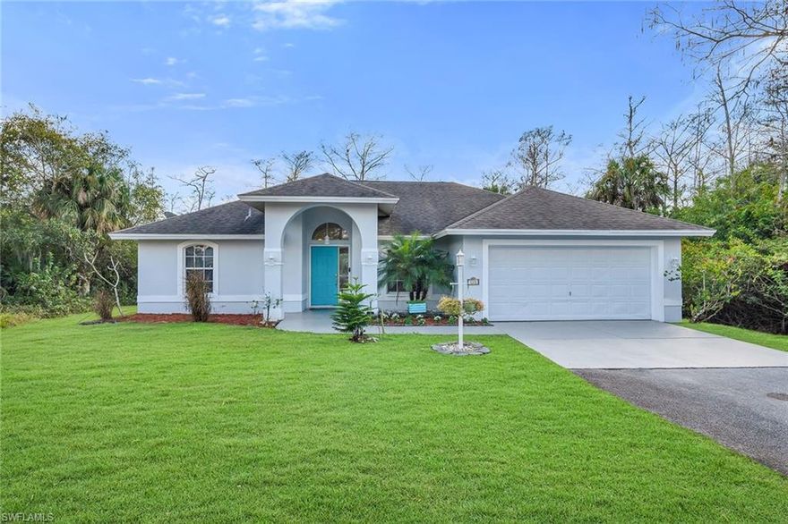 Set on an expansive 2.73-acre homesite within Golden Gate Estates, this inviting three-bedroom, two-bath pool home delivers privacy, space, and the ease of estate-style living, all within an X flood zone, with no requirement for additional flood insurance. No HOA. Horses and guest house allowed. Enjoy Close Proximity to Two Publix Stores, Aldi’s, and the new Big Corkscrew Island Regional Park. Easy Drive to Arthrex, and Ave Maria University. Elementary, Middle, and High School just around the corner.  Southern exposure fills the home with natural light throughout the day, while a roof replaced in 2018, new HVAC system in 2023, adds long-term peace of mind. Thoughtfully designed and well maintained, the residence blends indoor comfort with generous outdoor living surrounded by lush natural surroundings. The floor plan offers three bedrooms, two baths, dining room, family room , breakfast nook, and a two-car attached garage, creating a functional layout well suited for everyday living and entertaining. At the heart of the home, the kitchen enjoys pool and landscaped views and features quartz countertops, stainless steel appliances, pantry, and two-seat bar seating. Glass sliders open directly to the screened lanai from the breakfast nook, allowing seamless indoor-outdoor flow and making the space ideal for casual gatherings or quiet mornings overlooking the pool. The kitchen remains open to the family and dining room, enhancing connectivity throughout the home. The living room also captures serene pool and greenery views and provides additional access to the lanai through full pocketing glass sliders, that is the epitome of indoor-outdoor living. Adjacent, the family room adds architectural character with vaulted ceilings and a sunlit backdrop, offering a comfortable setting for relaxing or entertaining. A separate dining room is conveniently located off both the living room and kitchen, and is accented by an updated hanging light fixture that defines the space while maintaining an open feel. The primary bedroom serves as a peaceful retreat, highlighted by a tray ceiling and easy access to the main living areas. The primary bath features a double vanity, walk-in shower, and water closet, designed for both function and comfort. Two guest bedrooms provide flexibility for family, guests, or home office needs, one offering tile flooring and a ceiling fan, and the other featuring a ceiling fan for year-round comfort. A nearby guest bathroom includes a tub-shower combination, updated vanity and light fixture, and wood-look tile flooring. Outdoor living takes center stage on the expansive screened lanai, where the pool is framed by lush landscaping views and cooled by a ceiling fan, creating an ideal space for entertaining or enjoying the peaceful surroundings. With acreage, southern exposure, and a well-balanced layout, this Golden Gate Estates property offers a rare opportunity for easy access to amenities, space, privacy, and relaxed Florida living.