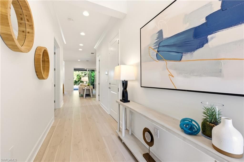 Photo of 11323 Jacaranda DR, NAPLES, FL 34120 (MLS # 225083973)