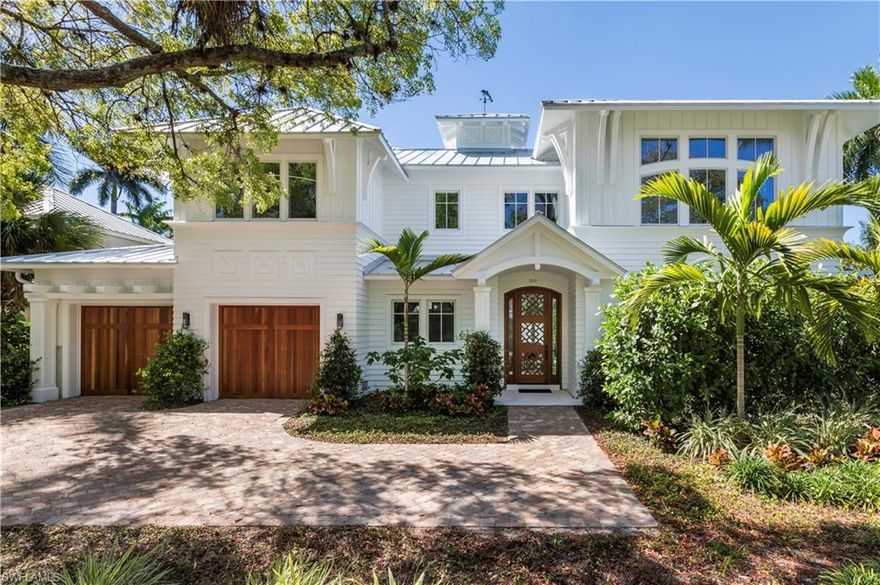 This furnished newly built home designed by MHK Architecture is perfectly situated just 2 blocks to the beach and a short stroll to Fifth Ave.  Open floor plan with 3740 Sq Ft has 54 ft of sliding pocketed doors to maximize the Florida outdoor living experience. With all important southern exposure, the sun lights up the home.  Four bedrooms, a huge bonus room, wide wood plank french oak floors, ceiling details, fireplaces, custom mahogany front door, luxurious baths, natural gas tankless H/W heaters and much more. Natural gas home. The open design kitchen features a SubZero refrigerator, Wolf natural gas range, quartz countertops.  Luxurious first floor master, bath has dual sinks, open shower, soaking tub.  3 bedrooms with baths on the second floor. Window lined hallway to a  stunning huge bonus room with high ceilings, wet bar, wine cooler and massive windows overlooking Old Naples. Enjoy the lovely pool and spa with water features, separate shelf pool with overflowing bowls creating the perfect ambiance. Entertain outdoors with summer kitchen w/built-in gas grill and electric roll down screens. Walk to the beach everyday for sunsets and experience the Olde Naples lifestyle!