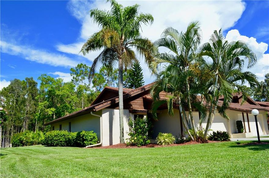 Rarely available Villa in Pinebrook Woods - Tall Pines subdivision! This updated end unit is a 2 Bedroom, 2 Bath, TRUE 2 Car Garage, that sits on an oversized lot with a water view. Located at the end of a quiet cul-de-sac, and just a short walk to the large community pool, you'll find this location to be ideal. Inside, you'll find vaulted ceilings, a remodeled kitchen with open flow to the great room, ample amounts of built-in storage in the kitchen as well as laundry, built in wine cooler, tile in all living areas & laminate wood flooring in bedrooms. The 10ft x 14ft Florida room is air-conditioned and serves as a great playroom or entertaining space. The guest and master bedrooms are spacious and both include large walk in closets. Association fee's cover the exterior insurance for the home, bi-annual driveway pressure washing, & many other included services. Pinebrook Woods is equipped with underground utilities and is located behind Bell Tower Shops, offering shopping, dinning, movie theater and more, all within walking distance. Situated only 15 minutes to the airport and beaches. Don't miss your opportunity to live in one of the most sought after locations in Fort Myers.
