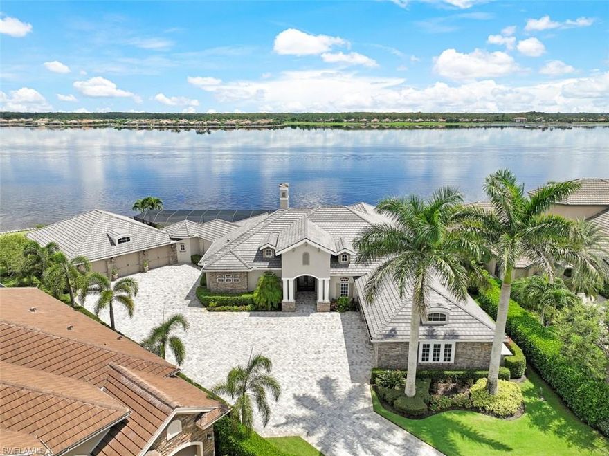 YOU CAN HAVE IT ALL - Cars, Boats, & Golf! This "casual lakefront luxury" CUSTOM home offers 3 Bed+Den, 4 Baths, & an 8 CAR CLIMATE CONTROLLED GARAGE! Situated at the end of a quiet cul-de-sac with over 250' of lake frontage on the 250 acre Stone Lake, you will enjoy lake watersports in a country club setting. The impressive lanai is complete with heated pool, infinity spa, fire bowls, putting green, and tons of covered space entertaining space. Inside, you will find that no detail was overlooked including coffered ceilings, two gas fireplaces, GE Monogram appliances, impact windows/doors, hurricane roll down shutters, whole house generator, and more! The Quarry is a lakefront community offering something for everyone: Boating, Golf, Tennis, Pickleball, Bocce Ball, Tiki Bar, Restaurant, Pool-Side Food/Drink Service, Gym, Social Activities including Full Time Social Director, and more! The Quarry offers a lifestyle like no other, including an impressive "Lake Lodge" and over 500 acres of navigable lakes and a private 18 hole Golf Club (Not Mandatory). An impressive $18M renovation and expansion of the Lake Lodge & Beach Club is under way and is slated to be completed early 2023.