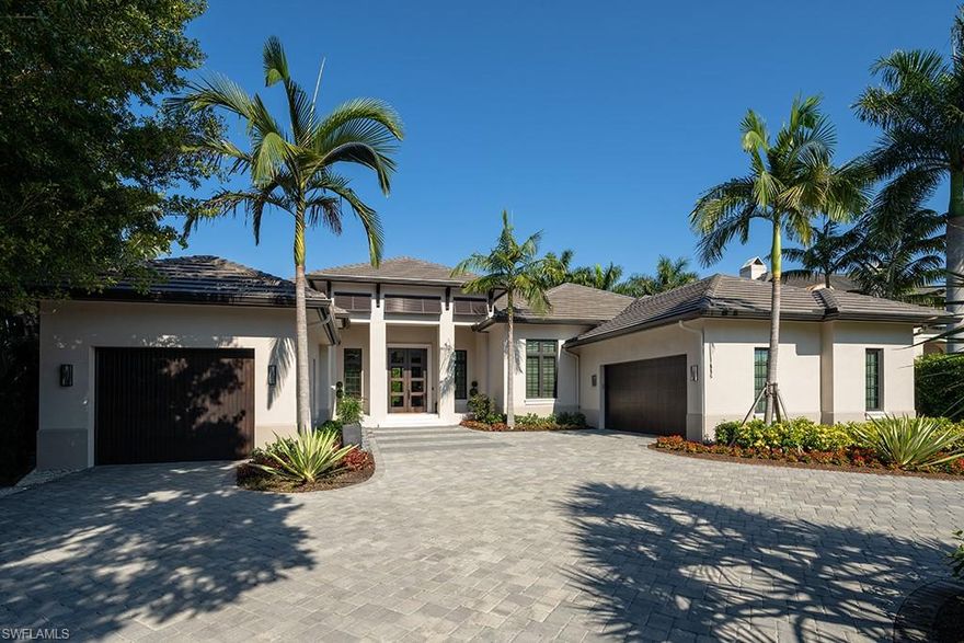 Exciting opportunity with a wonderful open floor plan gracefully situated on a very desirable street in the Moorings. Four spacious bedrooms, a den, and an additional office, all situated on one level, offer comfortable and private retreats for family and friends. The indoor spaces with remarkable ceiling detail transition harmoniously into the delightful covered outdoor space featuring a fireplace and the well-conceived pool area beyond. Three garage spaces. Conveniently located in the heart of Naples near the beaches and all of the amenities of both south and north Naples.