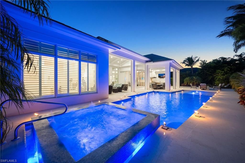 Photo of 383 Cuddy CT, NAPLES, FL 34103 (MLS # 225081322)