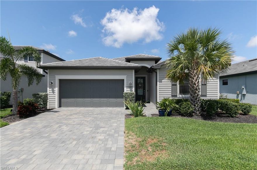 Welcome to this stunning split-floorplan home in Timber Creek with exclusive design features, offering a perfect blend of luxury and comfort. With 4 bedrooms, 3 bathrooms, and a range of exceptional amenities, this residence is a true gem.
Step inside and be greeted by an abundance of natural light cascading through the large glass doors, showcasing the spaciousness and elegance of the home. The Western exposure allows you to bask in the warmth of the sun while enjoying breathtaking views over the lake and a priceless Southwest Florida sunset. The highlight of the backyard is the inviting pool and hot tub. The outdoor kitchen is a true masterpiece equipped with a built-in grill, refrigerator, and ample counter space perfect for entertaining.  Not to be forgotten, the air-conditioned garage ensures that your vehicles and belongings are protected from the elements, while also providing an additional space that can be utilized as a workshop, gym, or storage area.  Don't miss the opportunity to make this exceptional property your own. This resort style community will open the doors to the amazing new amenity center this summer and this property is just steps away!  All furnishings negotiable.