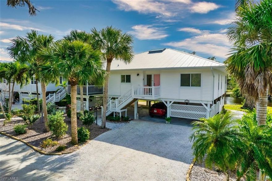 Nestled on a shell road sits a lake front community Periwinkle Pines that is the perfect balance of convenience and private seclusion. This bright and inviting contemporary piling home features 3 bedrooms and 2 baths, office area and great room with vaulted ceilings.  Sit on the large lanai overlooking the lake sipping your morning coffee watching the wildlife. 
New HVAC system July 2023, 5V metal roof April 2023, all ductwork replaced Dec. 2023, new electric box and shed rewired Jan 2024 and new washing machine Jan 2024.
Flood Ins $518 and wind and storm $5,799
One time fee of $250