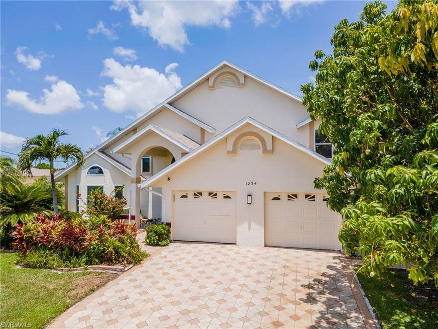 ASK ABOUT OWNER FINANCING ON THIS GULF ACCESS HOME NOT IN A FLOOD ZONE. This exceptional 3-bedroom, 2.5-bath residence offers over 2,100 square feet of living space on a prime Gulf access canal in highly desirable Southeast Cape Coral. Boaters will appreciate the 10,000-lb boat lift, 100 feet of waterfront, and quick access to open water. Best of all, the home is located in Flood Zone X, offering peace of mind and potential insurance savings. The property features a new roof (2021), AC (2019), and fully paid-off solar system, delivering long-term energy efficiency and lower utility costs. Inside, enjoy a newly remodeled kitchen with modern finishes, complemented by a whole-home reverse osmosis water system. A major highlight is the attached 1-bedroom, 1-bath in-law suite with a private entrance, currently rented for $1,500 per month, making this home ideal for multigenerational living or additional income potential. Perfectly situated near shopping, dining, and entertainment, this waterfront gem blends lifestyle, location, and investment opportunity, an ideal choice for Florida living.