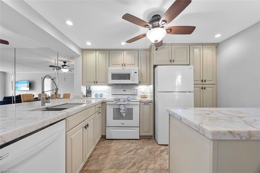 Experience Exceptional Value and Vibrant Living in Forest Lakes
Step into comfort and connection with this beautifully renovated 2-bedroom, 2-bath condominium nestled in the heart of Forest Lakes. Overlooking the manicured fairways of Quail Run Golf Club, this residence offers a fresh, modern kitchen, two elegantly updated bathrooms, and a generous lanai.
Forest Lakes is a warm and welcoming 55+ community celebrated for its active lifestyle, friendly neighbors, and impeccably maintained grounds. Residents enjoy access to three sparkling swimming pools, tennis courts, a lively clubhouse, and optional golf and social memberships at Quail Run—home to a scenic course and a thriving social calendar.
Convenience is key: you're just moments from Publix, Target, and Home Depot, with Naples’ world-renowned beaches only two miles away. With a deeded parking space and elevator access, this home blends ease and elegance in equal measure.
Move-in ready and priced to impress, this is one of Naples’ most compelling opportunities—a stylish, updated residence in a community that truly feels like home. Don’t miss your chance to embrace the lifestyle you’ve been dreaming of.