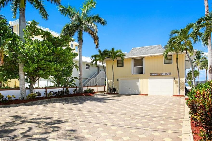 Incredible Gulf views await at this direct beachfront property located on the white sugar sands of Bonita Beach. This well maintained custom Beach Cottage aka “Beach Therapy” is perfect as-is or utilize the nearly 14,000 sq ft lot for your new dream home. The 2 Bedrooms and 2 Baths on the main living floor with Den are adjacent to the open Living Room, Dinning area and Kitchen. Lower level also includes master suite, bath and small kitchenette. This lot is ideally located 18 parcels north of Doc's Beach House and does not include any large undesirable trees and it is not adjacent to a Public Access and parking area.