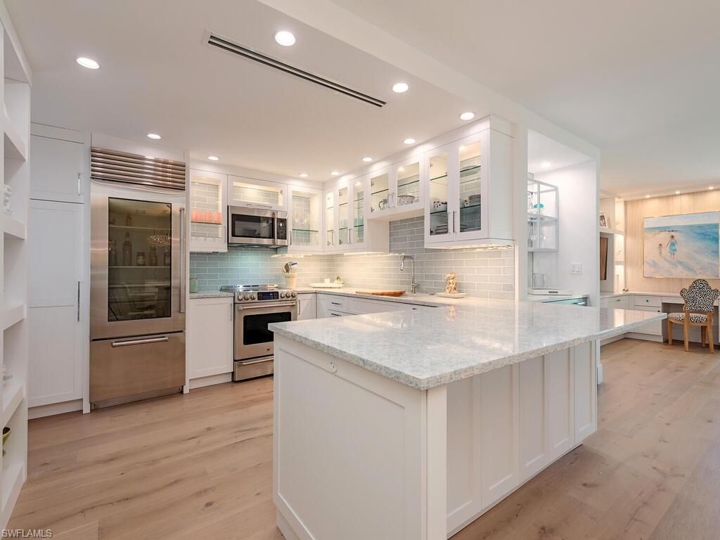 Photo of 2401 Gulf Shore BLVD N #11, NAPLES, FL 34103 (MLS # 225082609)