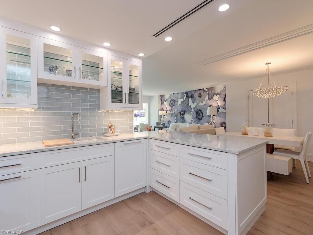 Photo of 2401 Gulf Shore BLVD N #11, NAPLES, FL 34103 (MLS # 225082609)